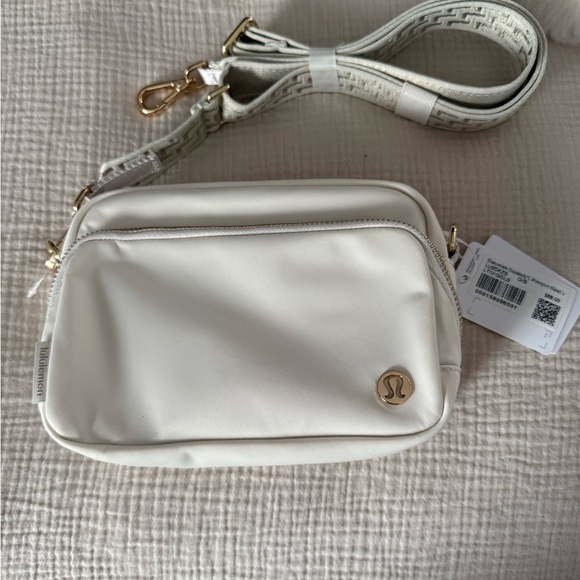 lululemon athletica Handbags - Lululemon Athletica Cream Crossbody Bag